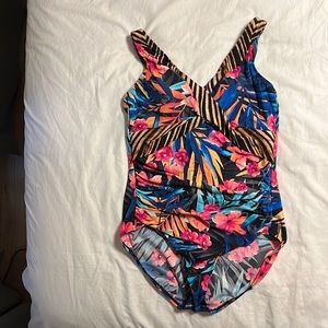 Miraclesuit swimsuit size 14, slimming one piece, floral and leopard print.